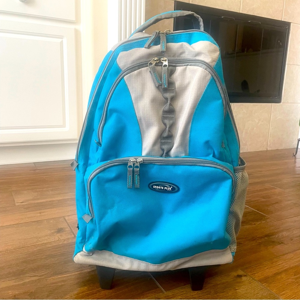 Olympia Blue Rolling Backpack